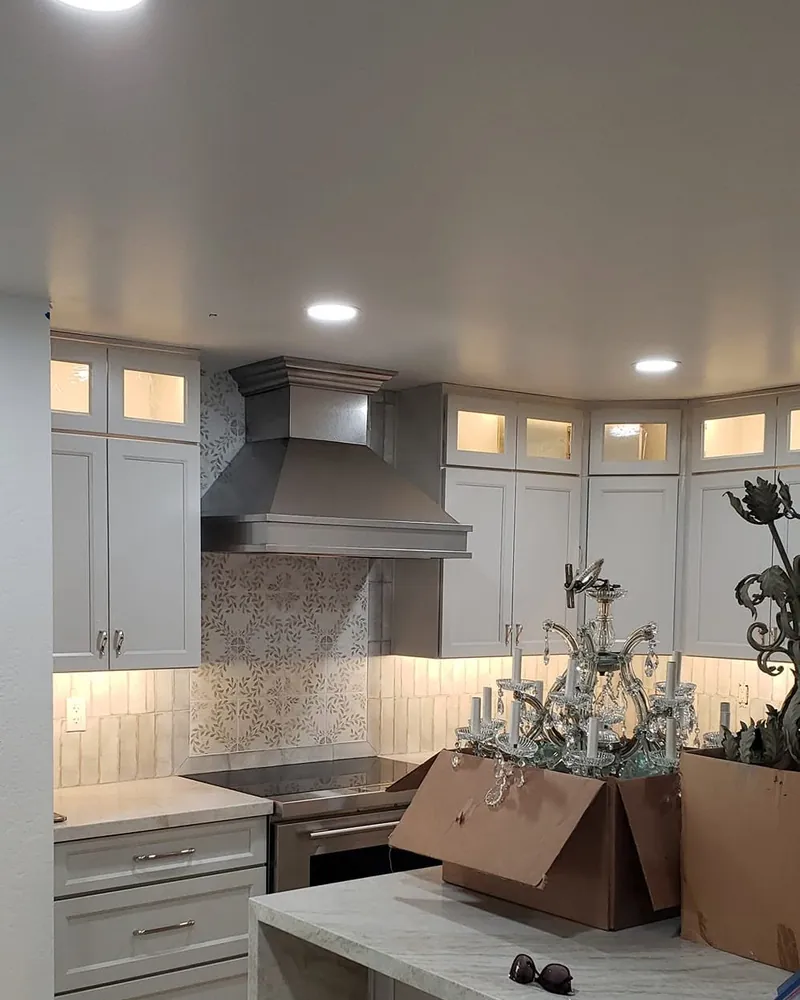 Kitchen remodel with recessed LED lights, under-cabinet lighting and glass-front cabinet lighting