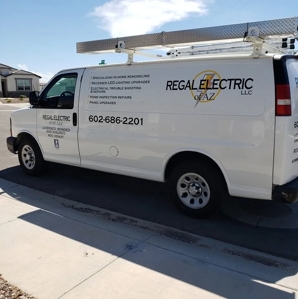 Regal Electric of AZ work van lettered with services, phone number and ROC 335437